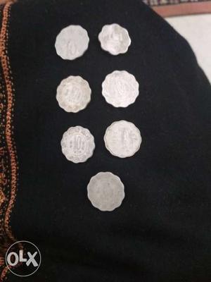 Seven Scalloped Edge Silver-color Coins