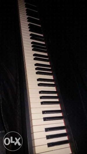 Yamaha P70 piano...rearly use.with case n adptore