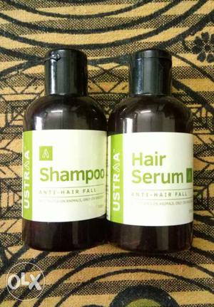 Hair Serum And Shampoo Bottles