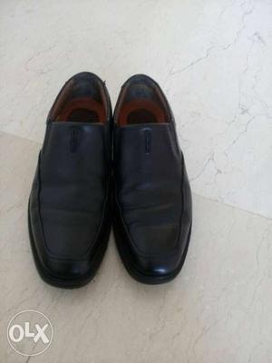 Pair Of Black Leather Slip On Formal Shoes
