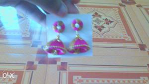 Pair Of Pink-and-brown Thread Jhumka Earrings