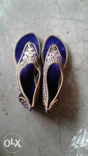 Women's Pair Of Blue T-strap Sandals