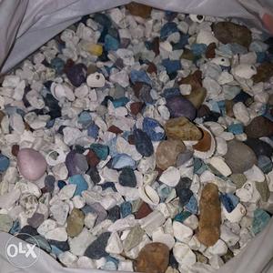 Aquarium pebbles and one small house for sell..