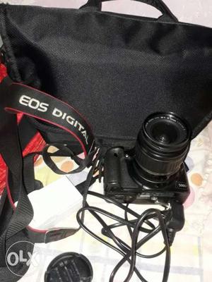 Canon 500D whith charger and 2gb card new beg