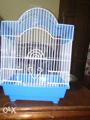 Two White And Black Metal Wire Pet Cages