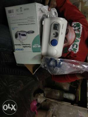 Gray And White Omron CompAir Compressor Nebuliser