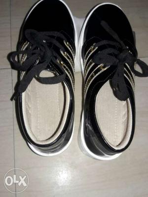 Black and white shoes naya shoes hai or ek bar
