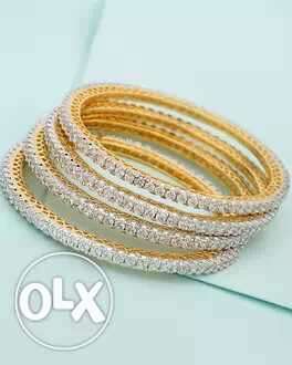 Four Gold-colored Clear Gemstone Tennis Bracelets