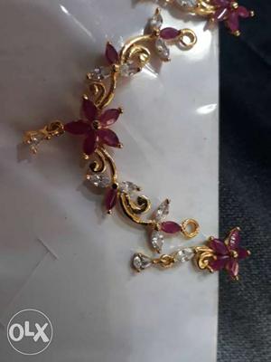 Gold-colored Ruby Embellished Floral Necklace