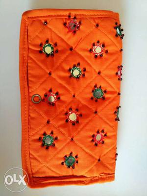 Hand made orange colour purse