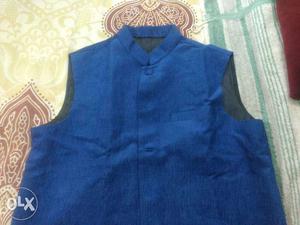 Overcoat 42 size not used fresh,costly,for urgent sale
