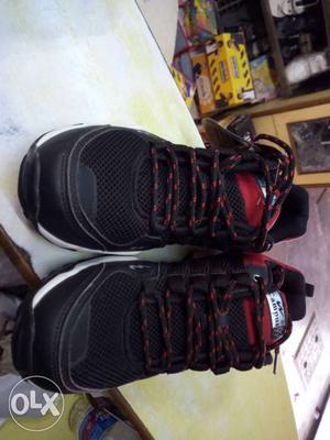 Pair Of Black Nike Basketball Shoes