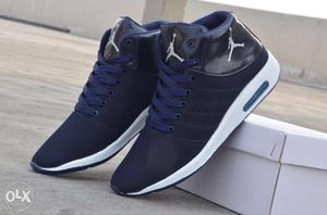Pair Of Blue-and-white Air Jordan Sneakers