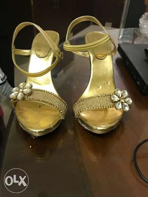 Pair Of Gold Ankle-strap Heeled Sandals