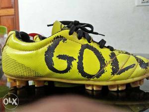 Pair Of Yellow-and-black Gold Cleats