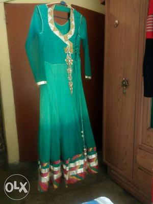 Party wear long net fabric suit. with dupatta nd