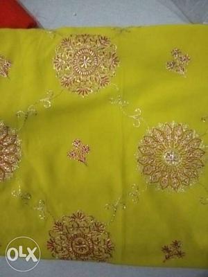 Yellow And Beige Floral Textile