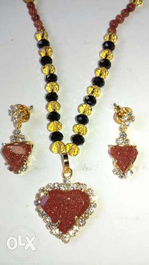 Yellow, Red And Black Beaded Necklace And Earrings
