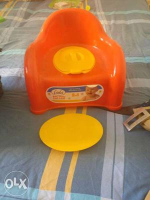 Baby's Orange And Yellow Potty Trainer. Not single day used