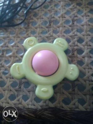 Baby's Pink And Beige Rattle Toy