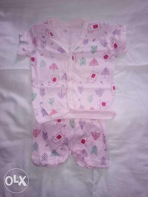 Baby's Pink And White Onesie