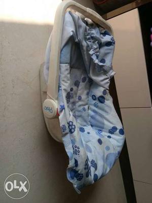 Baby's White And Blue Car Seat Carrier