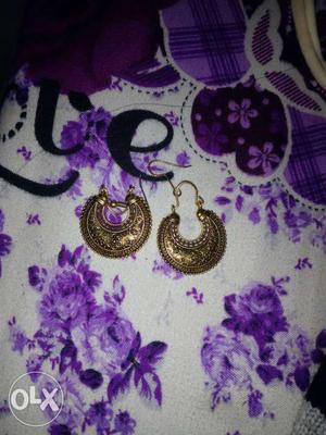 Golden earrings with superb looks