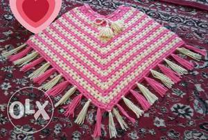 New hand made baby poncho