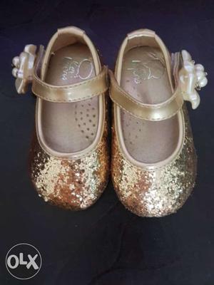 Pair Of Toddle's Gold-colored Mary Jane Shoes