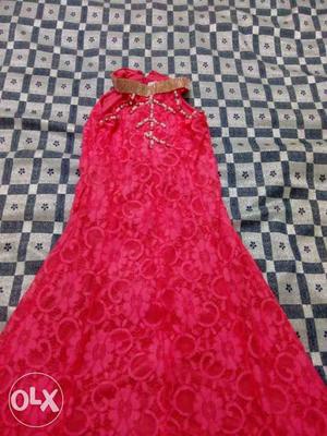 Pink gown for ten years old in net fabric