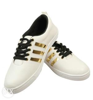 White shoes golden stripes sizes available 6-10