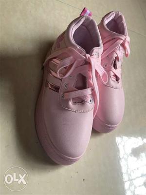Women's Pair Of Pink Leather Sneakers