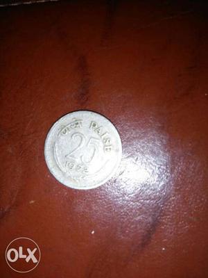 25 Paisa Coin.Year -  (round silver coloured)