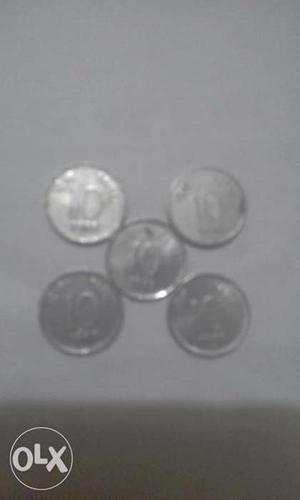 5 coins 10 paisa at 