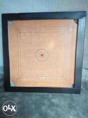 Brown And Black Wooden Carrom Boar