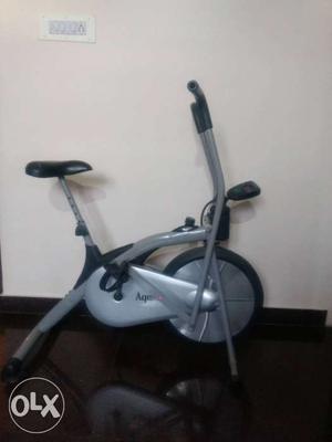 Cycle exerciser with tortion adjustment with