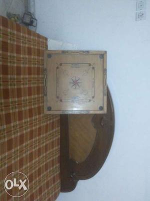 Fine wood syndicate carrom board price is
