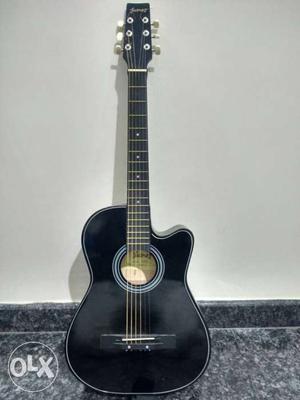 Guitar with bag good condition bought 15 days back