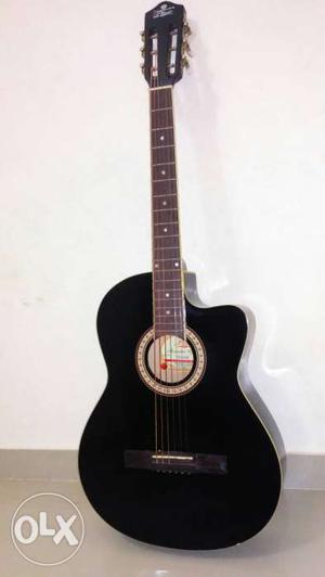 Pluto acoustic guitar (7 months old) for sale