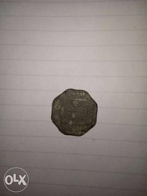 Scallop-edge Black Coin 4 annas coin