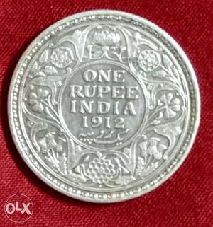 Silver and old con one rupee