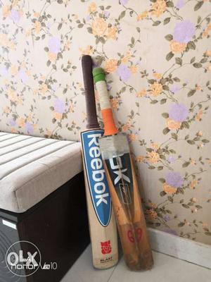 Two Beige And Brown Reebok Cricket Bats