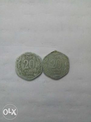 Two Diamond-shaped Silver-colored 20 Indian Paise Coins