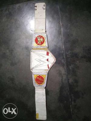 White, Red, And Yellow WWE Champion Belt