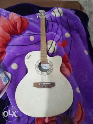 White color guitar in a good condition