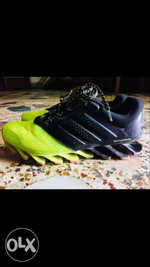 Black-and-green Adidas Springblades Shoes