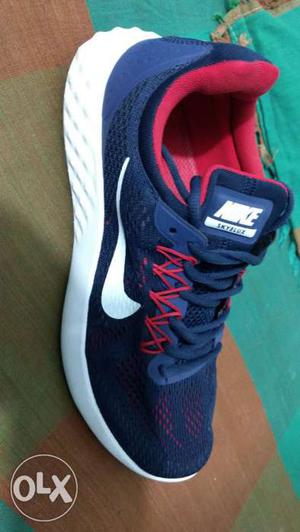 Blue And White Nike Running Shoe