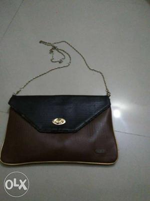 Brown And Black Leather Sling Bag
