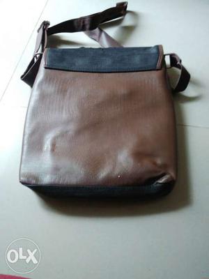 Brown And Lback Leather Sling Bag