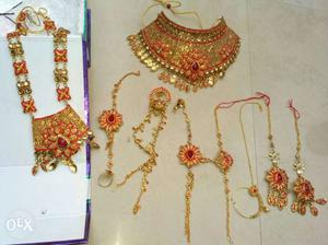 Gold-colored And Red Necklaces